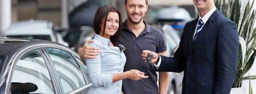 couple receiving car keys