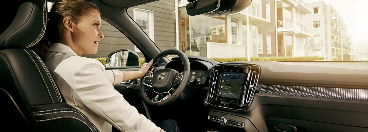 a girl driving a car