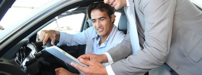 Financer explaining interest rate to customer