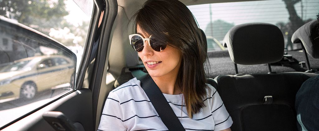 a girl travelling in a car